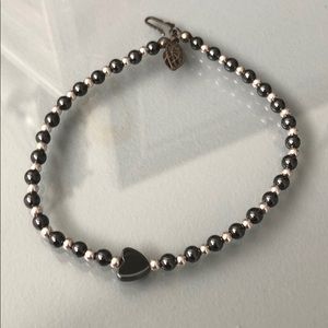 9.5 inch anklet with heart detail.